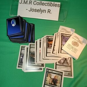 60+ cards and 2 rule books. 1996 mixed Star Trek The Next Generation games card